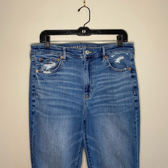 American Eagle Super Hi-Rise Flare Medium Wash Distressed Jeans, size 12 - Picture 3 of 11